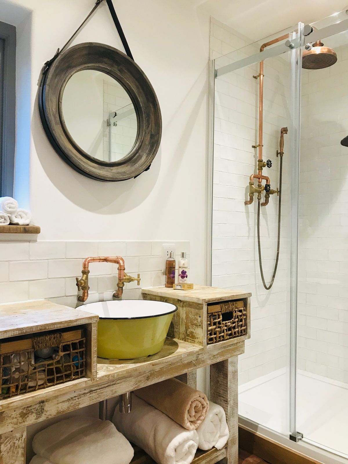small bathroom with metro tiles and reclaimed materials