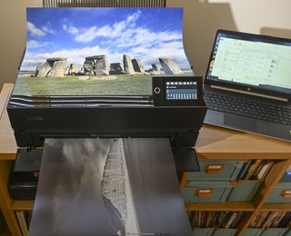 Epson SureColor SC-P900 large format printer on a desk