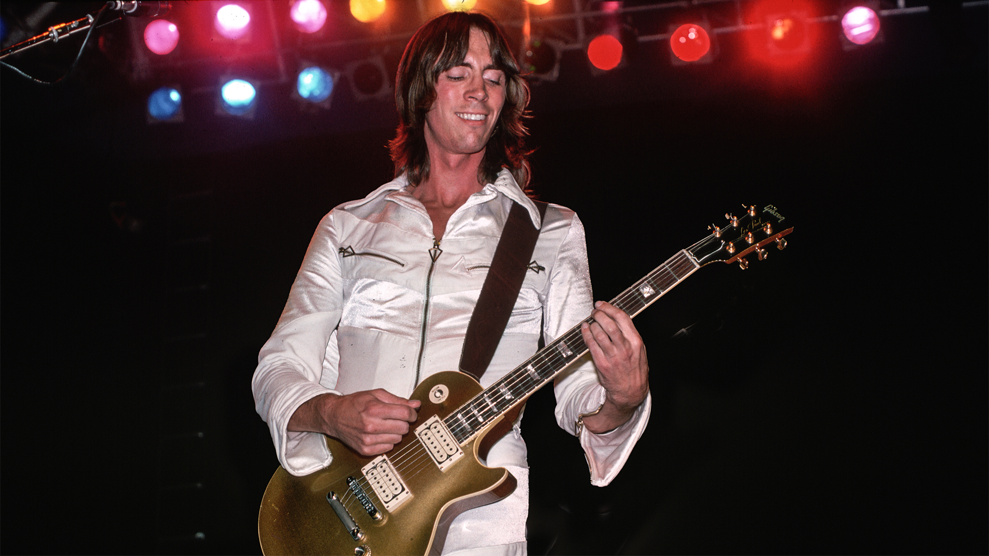 Tom Scholz on stage performing with Boston. Photograph, 1978. 