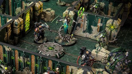 Kill Team: Tomb World miniatures amongst terrain, and against a dungeon-style board