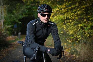 Male rider wearing a black Castelli Espresso Air jacket