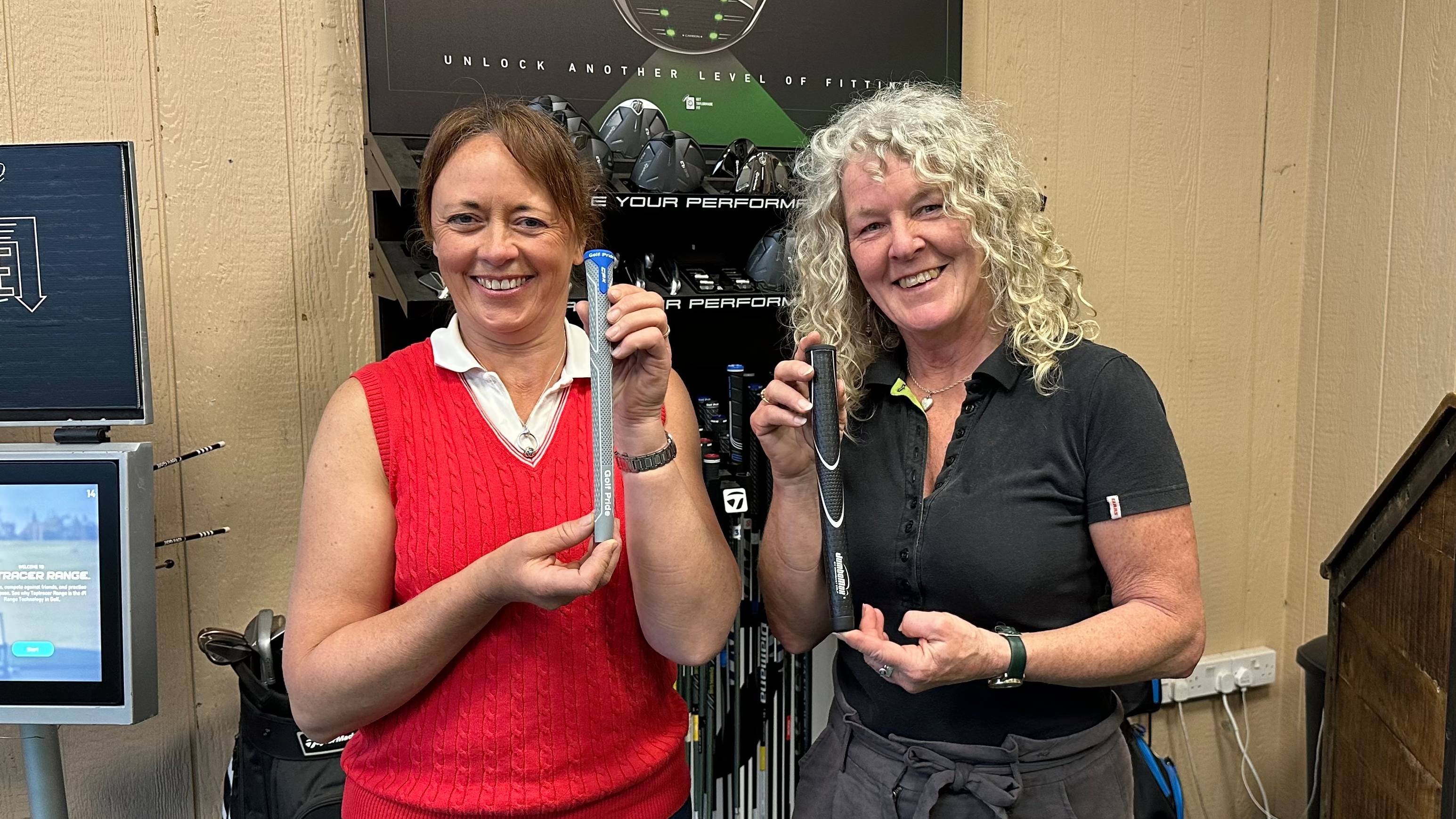 Two female golfers with custom fit golf grips