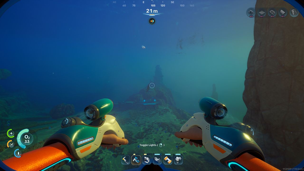 Subnautica 2 sulfur: A player swimming towards a rocky mound in a relatively open sea bed.