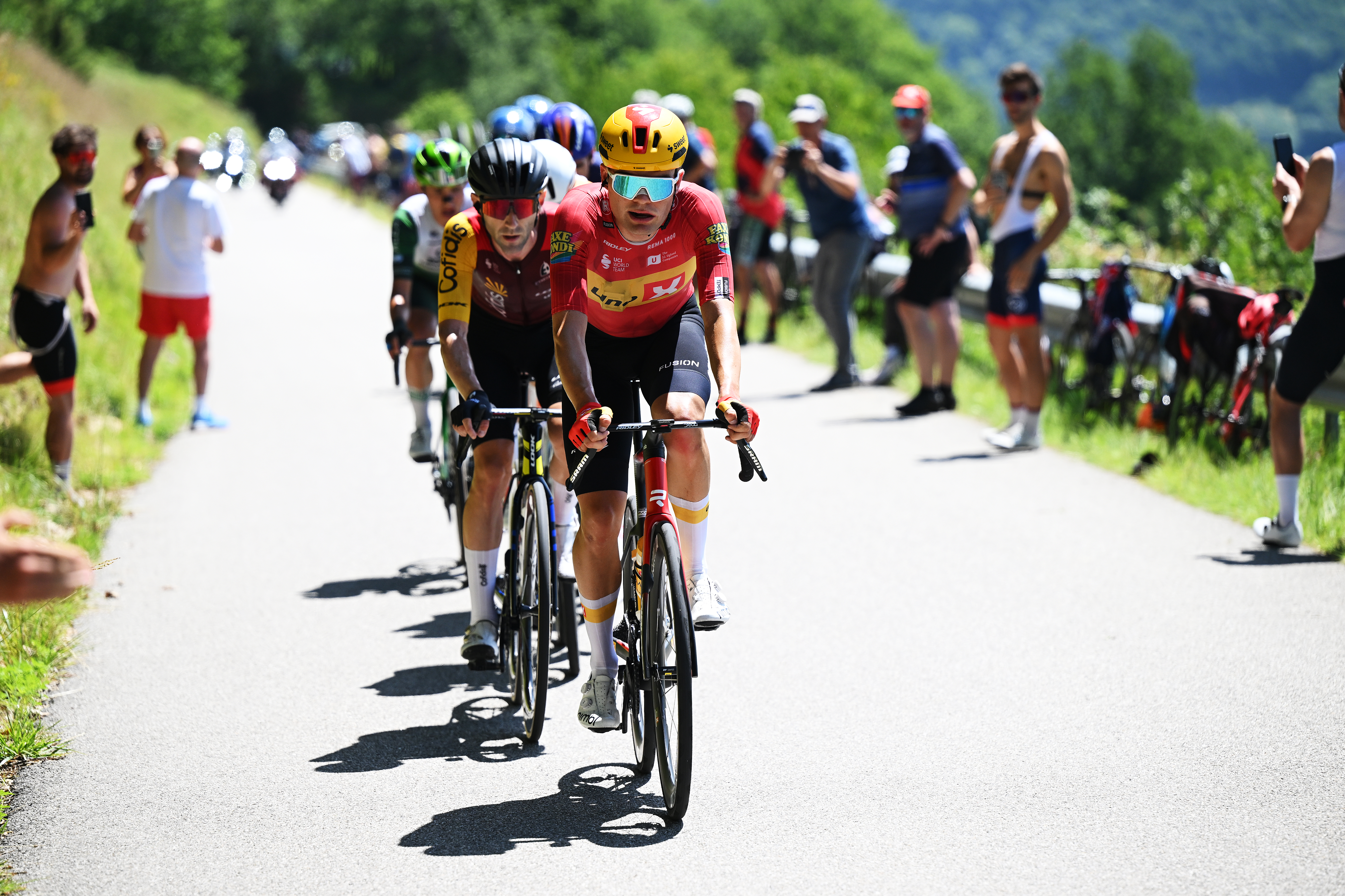 Anthon Charmig (Uno-X Mobility) and Benjamin Thomas (Cofidis) compete in the breakaway during the 2026 Tour Auvergne-Rhone-Alpes, stage 2.