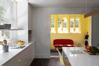 white and yellow kitchen and living room