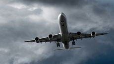 jet airplane landing in storm.