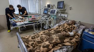 People receive medical attention in a hospital after an attack by Russian forces on March 8, 2022 in Kyiv, Ukraine.