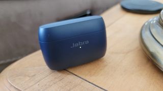 The Jabra Elite 4 Active charging case being powered