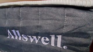 Review image shows The Allswell mattress with rumpled edges because it was kept in a box for too long before shipping