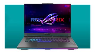The Asus ROG Strix G16 gaming laptop on a teals deal background