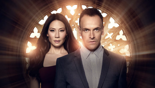 Jonny Lee Miller and Lucy Liu in Elementary