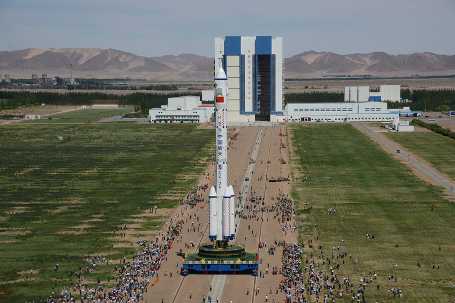 Long March II-F Rocket Transported to Launch Pad