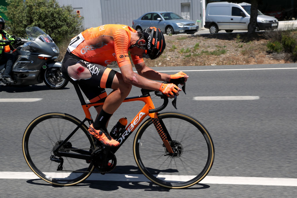 ALCALA LA REAL SPAIN MAY 19 Antonio Jess Soto Guirao of Spain and Team Euskaltel Euskadi involved in a crash during the 67th Vuelta A Andalucia Ruta Del Sol 2021 Stage 2 a 183km stage from Iznajar to Alcal la Real 1028m Injury VCANDALUCIA on May 19 2021 in Alcala la Real Spain Photo by Gonzalo Arroyo MorenoGetty Images