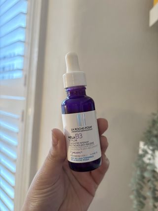 Mica Ricketts holding La Roche-Posay MelaB3 Serum