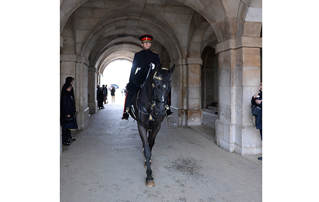 Captain Mulholland heads through the arch at Horse Guards, ready for the 4 O&rsquo;Clock inspection