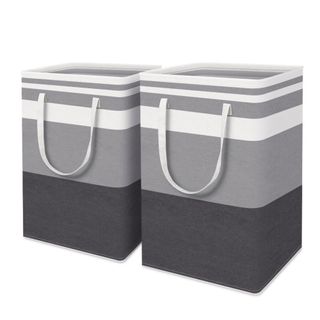 Two gray and white striped laundry hampers