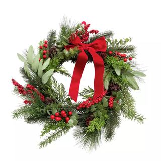 Traditional Christmas wreath with red bow