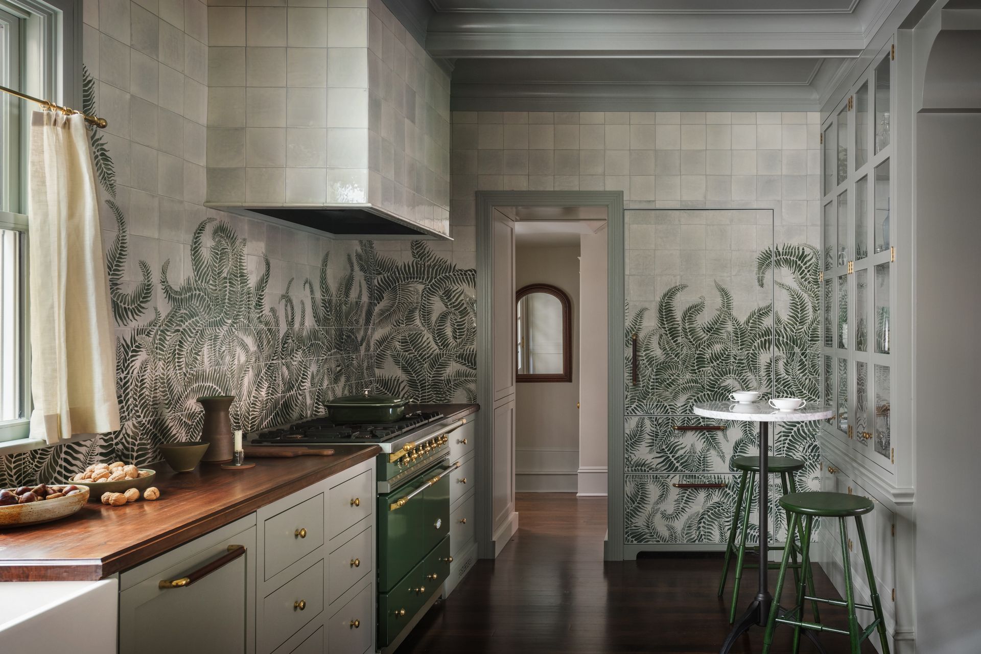 kitchen with grey walls a green mural