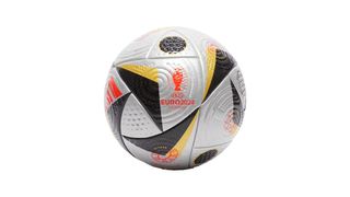 A grey football with black triangular patterns shows off the Euro 2024 logo in red in the centre.