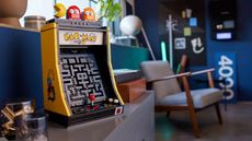 Lego Pac-Man Arcade on a sideboard in a living room
