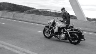 A black and white image of Austin Butler's Benny on his motorbike in The Bikeriders film, one of 2023's new movies