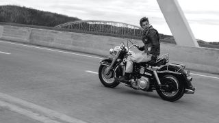 A black and white image of Austin Butler's Benny on his motorbike in The Bikeriders, one of June's new movies