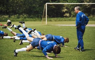 England manager Alf Ramsey supervises a training session, circa 1969.