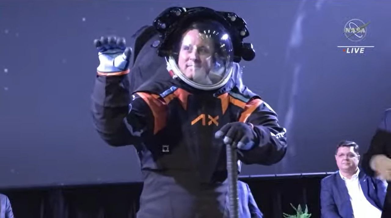 Axiom Space's Jim Stein in the company's Artemis moon spacesuit during a reveal event.