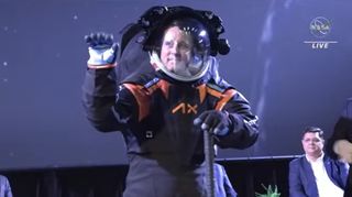 Axiom Space's Jim Stein in the company's Artemis moon spacesuit during a reveal event.
