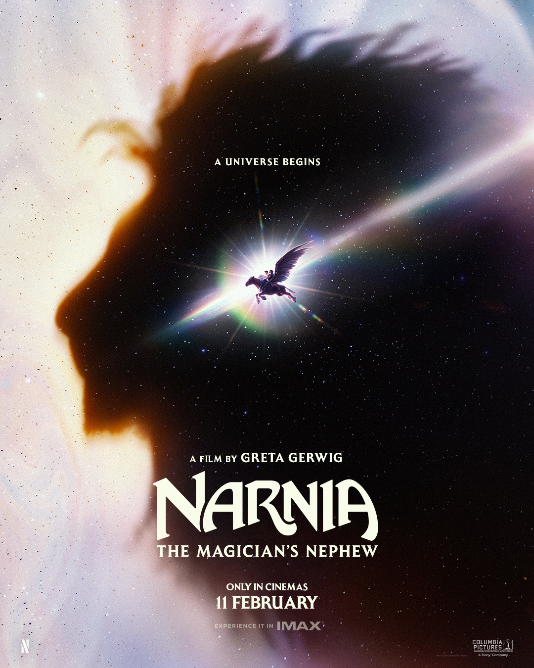Teaser poster for Narnia: The Magician&amp;rsquo;s Nephew, showing the silhouette of Aslan&amp;rsquo;s head in profile, filled with stars and edged in amber light, against a pale, pearly background