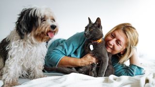 Woman with dog and cat