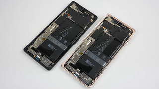 Two Pixel 6 Pro handsets with the displays removed, exposing the circuitry beneath