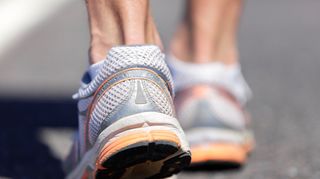 Close-up of runner’s achilles tendon