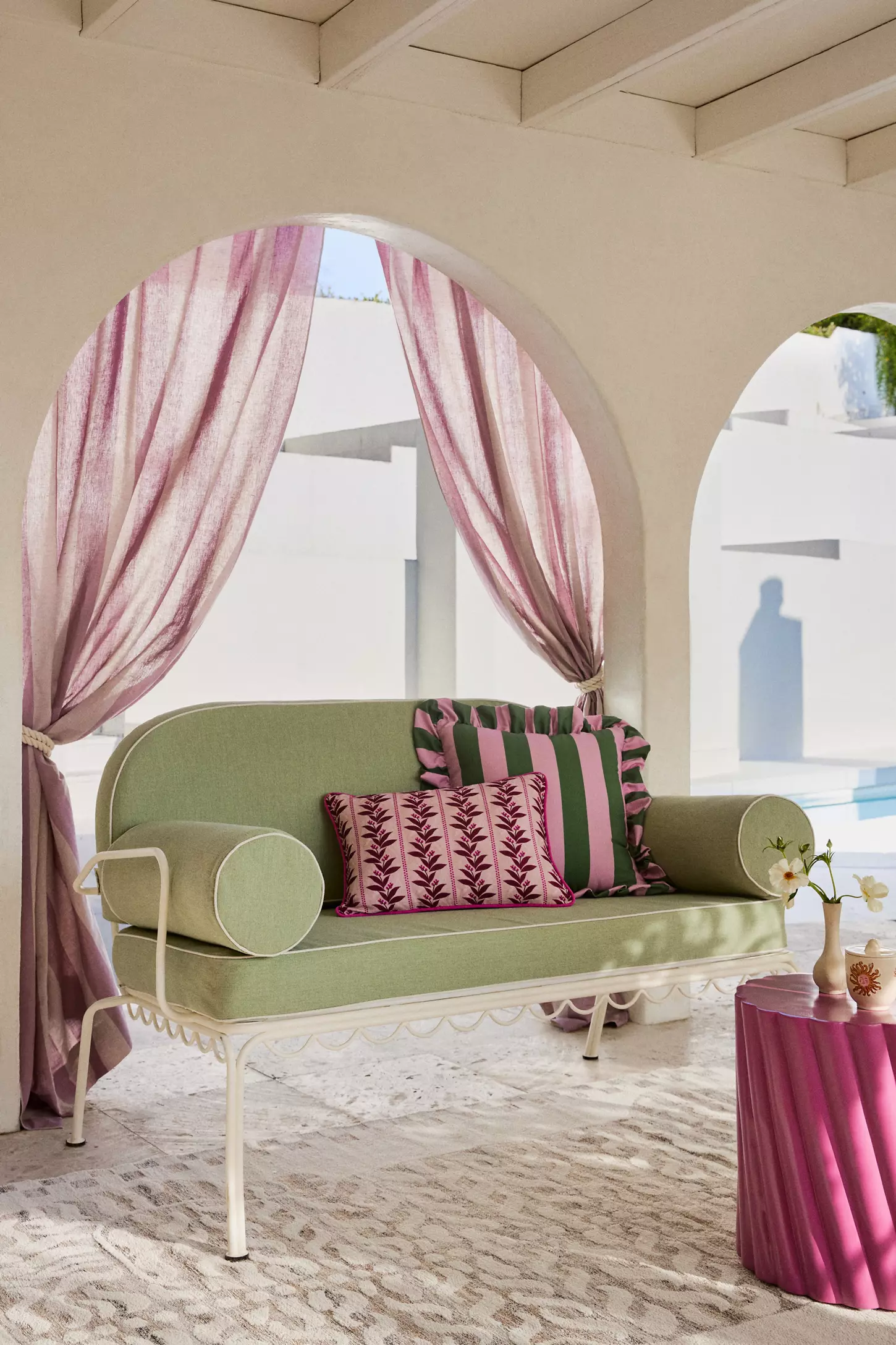 Anthropologie outdoor loveseat and cushions