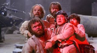 (From left to right) Jack Purvis as Wally, Malcolm Dixon as Strutter, Tiny Ross as Vermin, David Rappaport as Randall, and Craig Warnock as Kevin in Time Bandits