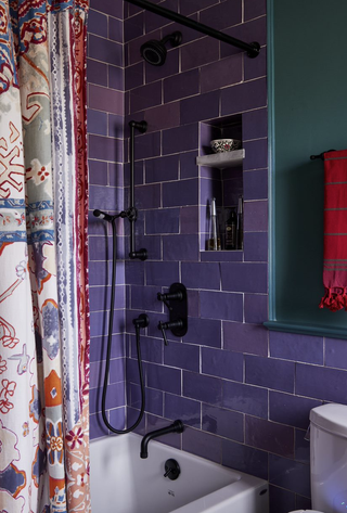 Purple tiled bathroom