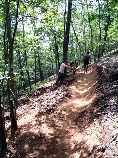 Locals volunteer to bench a section of Dowell's Draft trail.