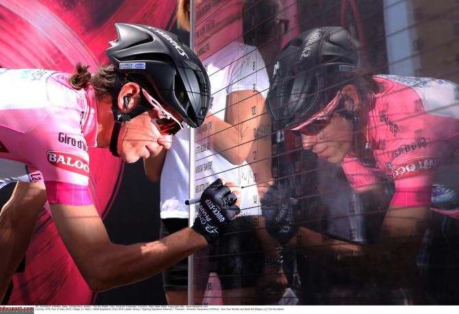 Two Rigoberto Uran's sign on