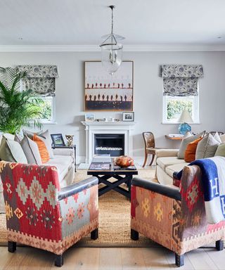 moroccan style living room with sisal rug and fireplace