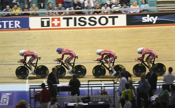 The British men's pursuit team on their way to the gold medal