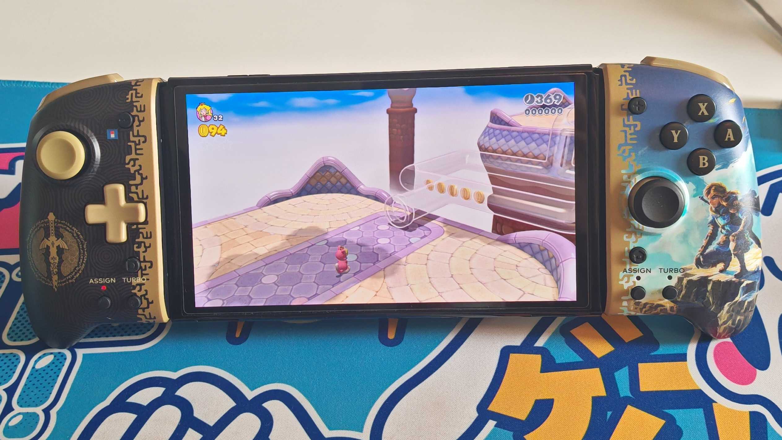 The Hori Split Pad Pro is used to play Super Mario games on Nintendo Switch OLED.