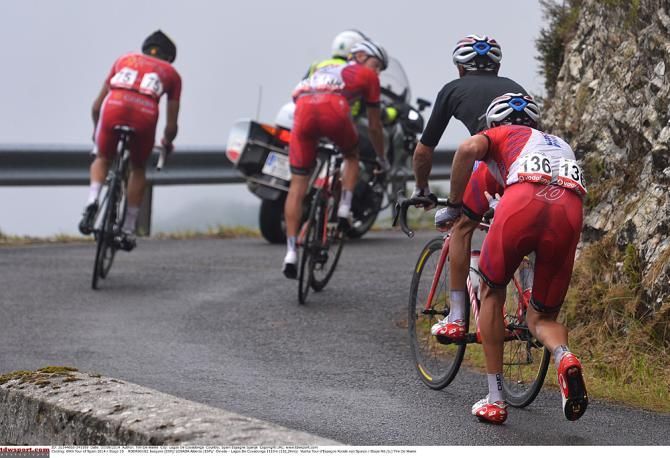 Joaquim Rodriguez gets held after a mechanical from his Katusha teammates