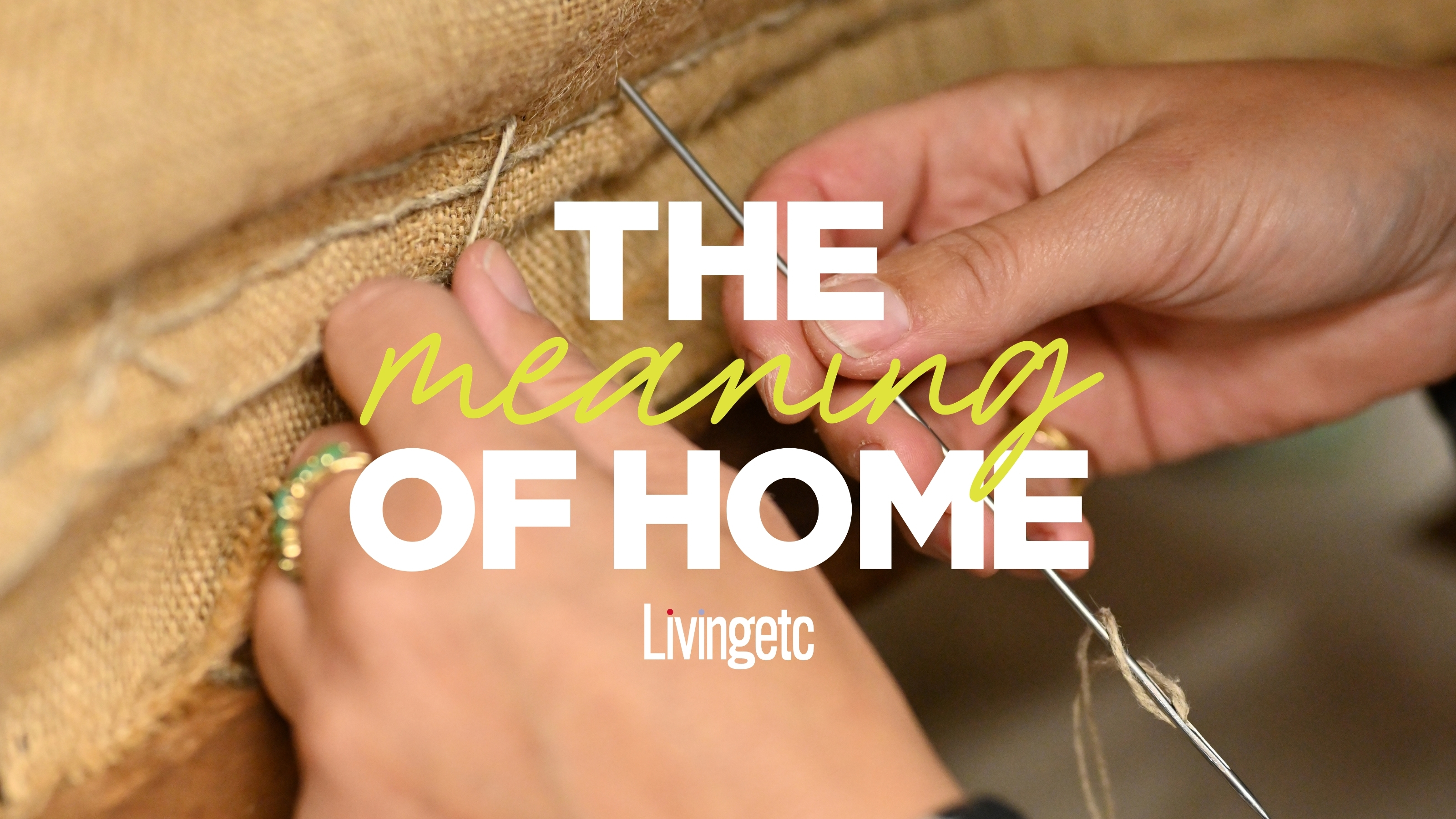 Close-ups of an upholsterer sewing armchairs with a wooden base in a workshop, overlaid with a white and yellow banner that reads "The Meaning of Home".