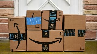 Amazon cardboard boxes sitting on doorstep