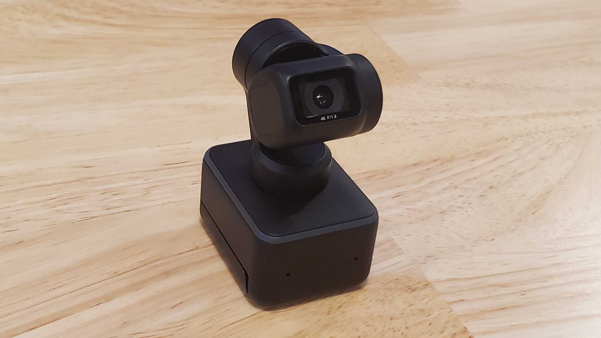 An Insta360 Link on a table without a tripod