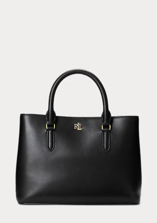 a black bag from ralph lauren in front of a plain backdrop