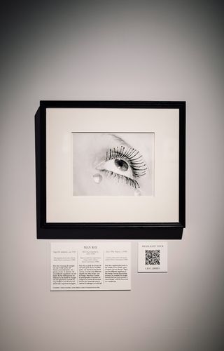 Man Ray photograph of eye and tears in gallery