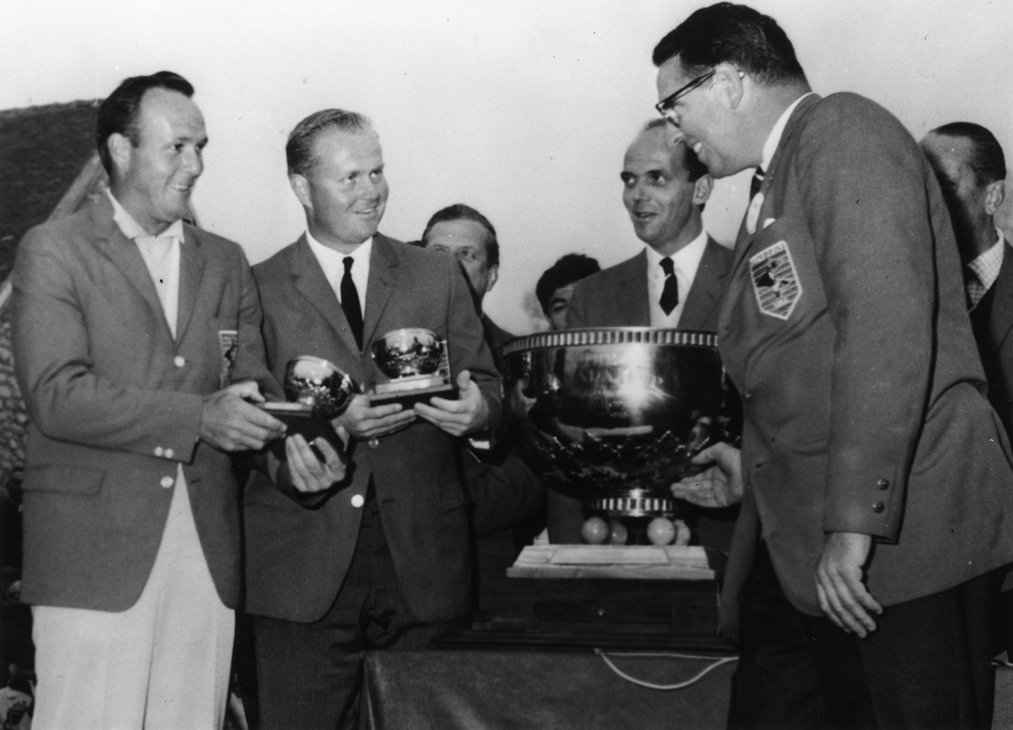 Arnold Palmer (left) and Jack Nicklaus receive their prizes after they had won the Canada Cup at St-Nom-La-Breteche in 1963