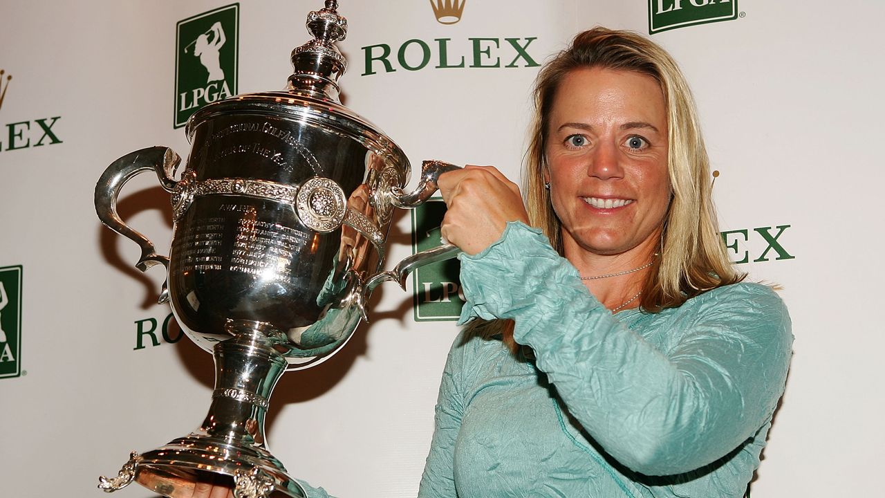 Annika Sorenstam holds the Player of the Year trophy