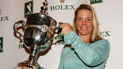 Annika Sorenstam holds the Player of the Year trophy